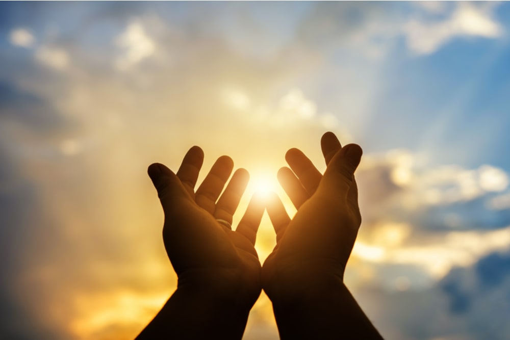 Human hands open palm up worship