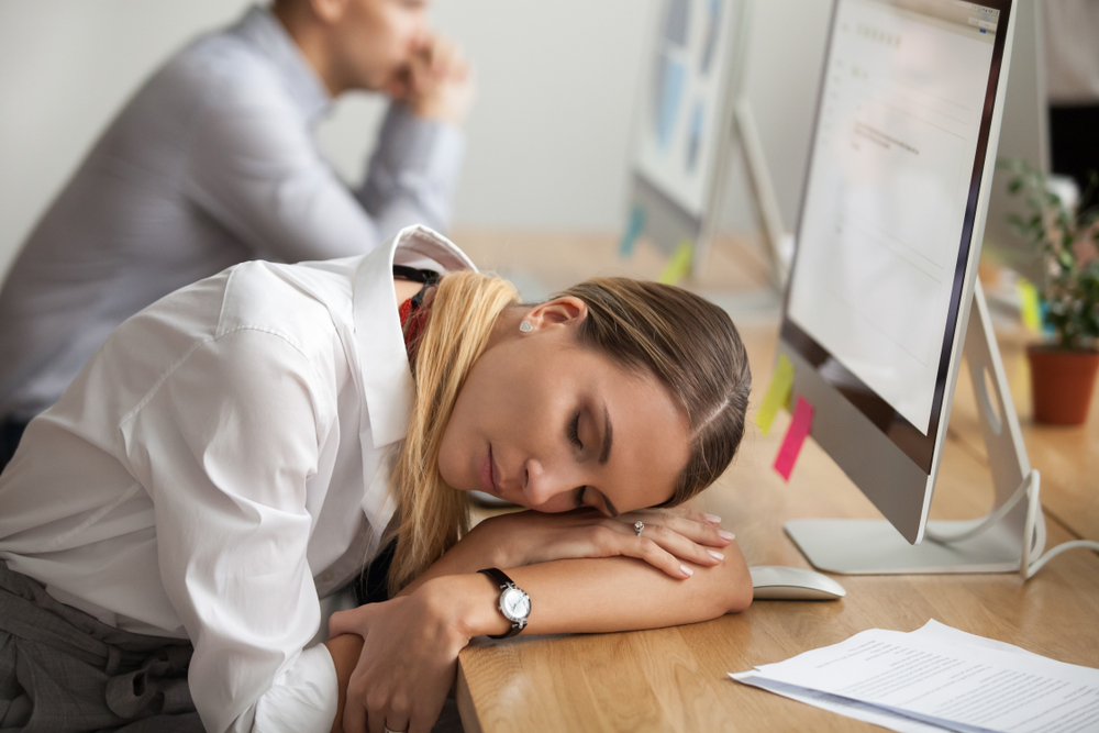 woman sleeping in the office